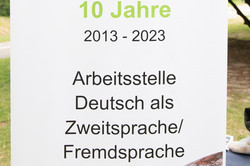 Banner mit der Aufschrift 10 Jahre Arbeitsstelle Deutsch als Zweit- und Fremdsprache